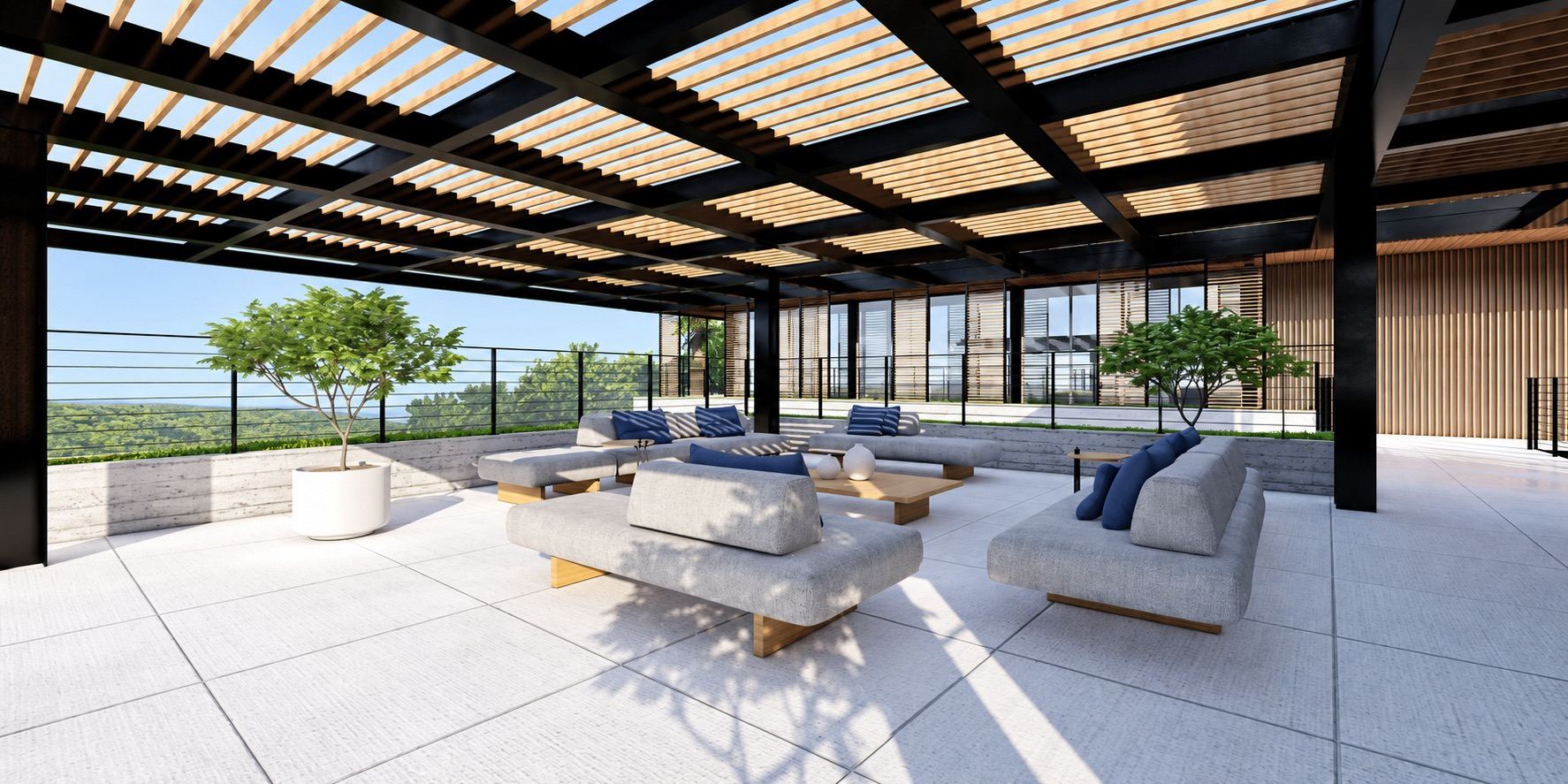 Rooftop com mirante, sofás e pérgola sobre a mata